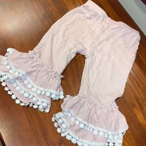 Flare pants with tassels